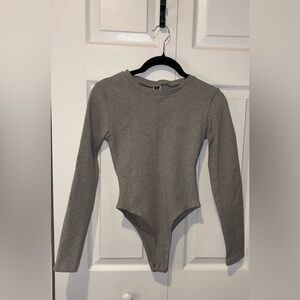 NWOT Gray Long Sleeve Woman’s One Piece